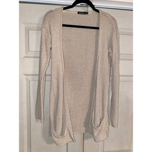 Boohoo cream waffle knit cardigan with pockets in a size S/M